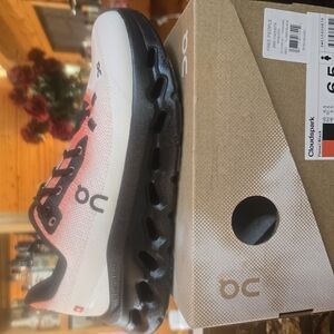 On Running Black and White Sneakers with Breathable Upper